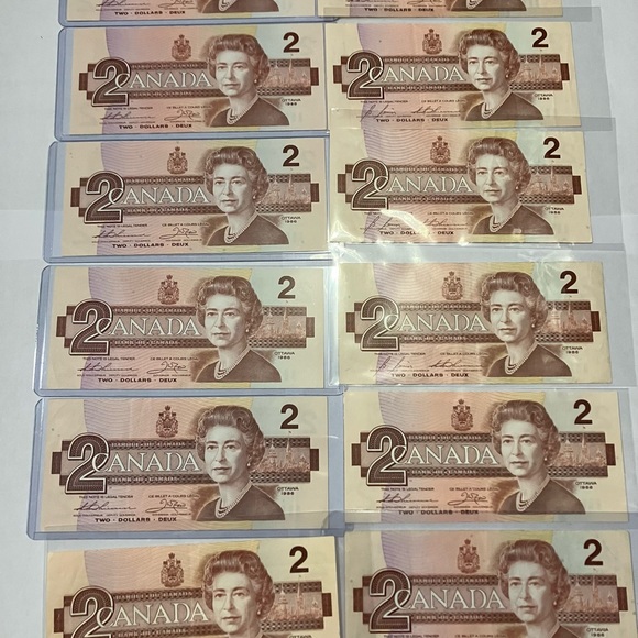 1986 - Lot of 12 - $2 Bank of Canada Notes - Picture 1 of 2
